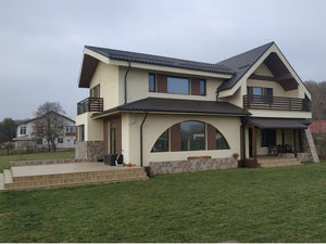 Applying Decorative Brown Accents to Decorative Plaster on a House in Saftica thumbnail