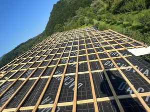 Application of Anti-Condensation Film and Wooden Soffit Cladding for the Roof of a Metal House thumbnail