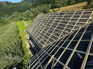Application of Anti-Condensation Film and Wooden Soffit Cladding for the Roof of a Metal House thumbnail