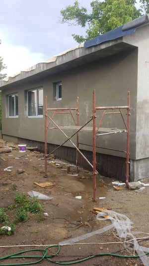 Applying Spackle to the Facade of a Metal House Project in Craiova thumbnail