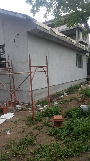 Applying Spackle to the Facade of a Metal House Project in Craiova thumbnail