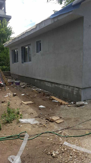 Applying Spackle to the Facade of a Metal House Project in Craiova thumbnail