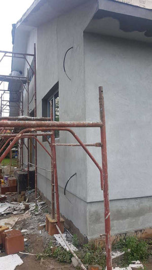Applying Spackle to the Facade of a Metal House Project in Craiova thumbnail
