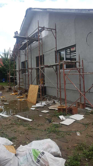 Applying Spackle to the Facade of a Metal House Project in Craiova thumbnail