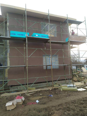 Applying Fiberglass Mesh, Adhesive, and Spackle to a House in Snagov thumbnail