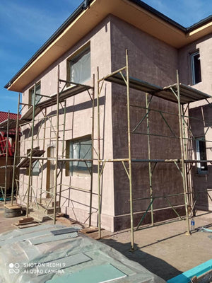 Applying Fiberglass Mesh, Adhesive, and Spackle to a House in Snagov thumbnail