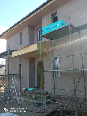 Applying Fiberglass Mesh, Adhesive, and Spackle to a House in Snagov thumbnail