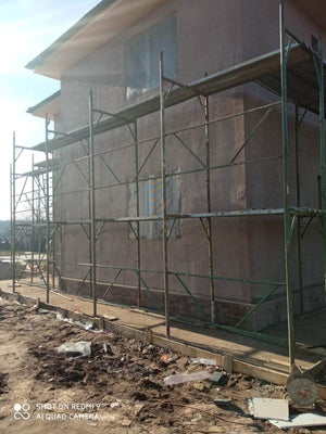 Applying Fiberglass Mesh, Adhesive, and Spackle to a House in Snagov thumbnail