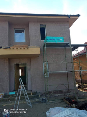 Applying Fiberglass Mesh, Adhesive, and Spackle to a House in Snagov thumbnail