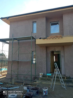 Applying Fiberglass Mesh, Adhesive, and Spackle to a House in Snagov thumbnail