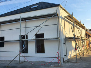 Applying Textured Decorative Plaster to a 191 sqm Metal House in Sibiu thumbnail