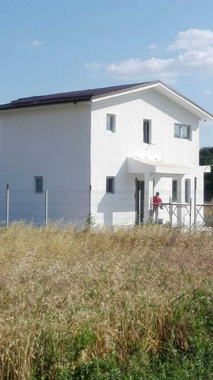 Applying Textured Decorative Plaster to a Metal House in Domnesti thumbnail