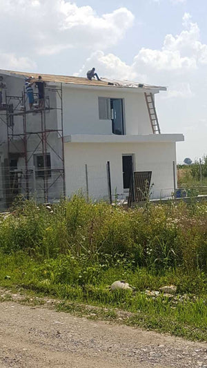 Applying Textured Decorative Plaster to a Metal House in Domnesti thumbnail