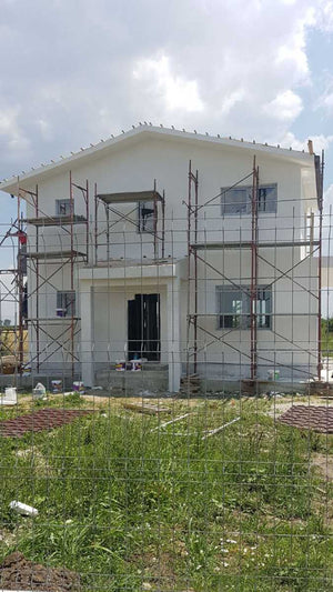 Applying Textured Decorative Plaster to a Metal House in Domnesti thumbnail