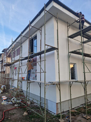 Application of Silicon Decorative Plaster for Two-Story Metal House in Bucharest thumbnail