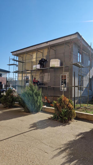 Application of Silicon Decorative Plaster for Two-Story Metal House in Bucharest thumbnail