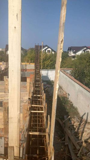 Reinforcing, Formwork, and Pouring Beams and Ground Floor Slab for a House on Masonry in Mogosoaia thumbnail