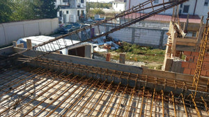 Reinforcing, Formwork, and Pouring Beams and Ground Floor Slab for a House on Masonry in Mogosoaia thumbnail