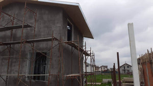 Two-Story House Installation of Fiberglass Mesh, Adhesive, and Spackle thumbnail