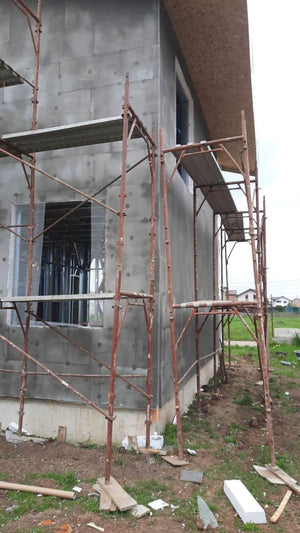 Two-Story House Installation of Fiberglass Mesh, Adhesive, and Spackle thumbnail