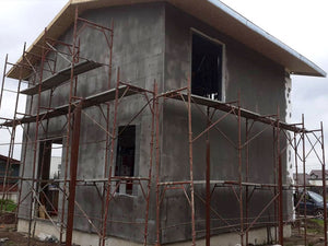 Two-Story House Installation of Fiberglass Mesh, Adhesive, and Spackle thumbnail