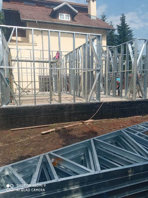 Under-Construction House with Installation of Metal Frame Wall Panels thumbnail