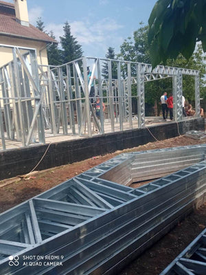 Under-Construction House with Installation of Metal Frame Wall Panels thumbnail