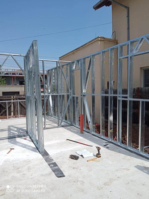 Under-Construction House with Installation of Metal Frame Wall Panels thumbnail