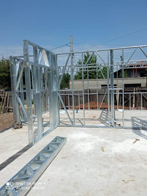 Under-Construction House with Installation of Metal Frame Wall Panels thumbnail