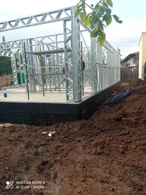 Under-Construction House with Installation of Metal Frame Wall Panels thumbnail