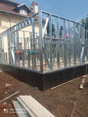 Under-Construction House with Installation of Metal Frame Wall Panels thumbnail