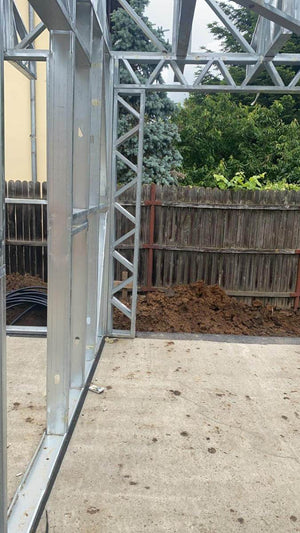 Under-Construction House with Installation of Metal Frame Wall Panels thumbnail