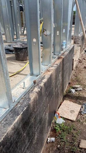 Under-Construction House with Installation of Metal Frame Wall Panels thumbnail