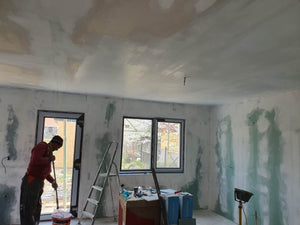 Metal House Construction Site Applying Primer Layer and Vinaro thumbnail