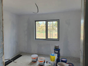 Metal House Construction Site Applying Primer Layer and Vinaro thumbnail