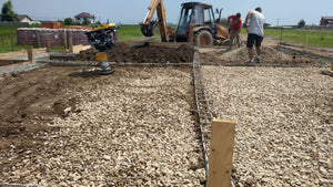 Compacting and Pouring the Foundation Slab for a Metal House thumbnail