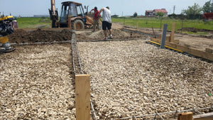 Compacting and Pouring the Foundation Slab for a Metal House thumbnail