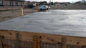 Compacting and Pouring the Foundation Slab for a Metal House thumbnail