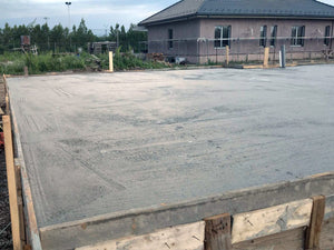 Compacting and Pouring the Foundation Slab for a Metal House thumbnail