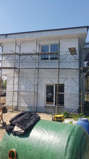 Construction of a 155 sqm House Applying Primer Layer on Facades thumbnail