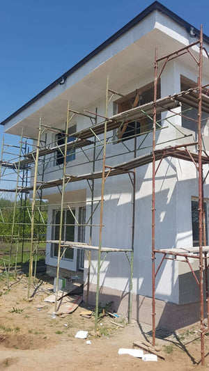 Construction of a 155 sqm House Applying Primer Layer on Facades thumbnail