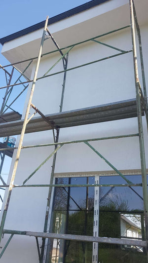 Construction of a 155 sqm House Applying Primer Layer on Facades thumbnail