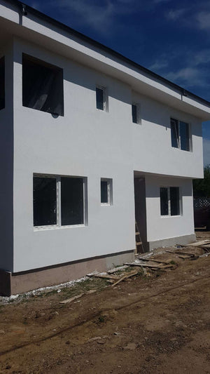 Construction of a 155 sqm House Applying Textured Decorative Plaster thumbnail