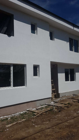 Construction of a 155 sqm House Applying Textured Decorative Plaster thumbnail