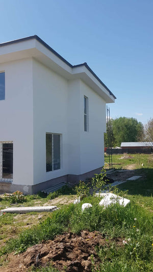 Construction of a 155 sqm House Applying Textured Decorative Plaster thumbnail