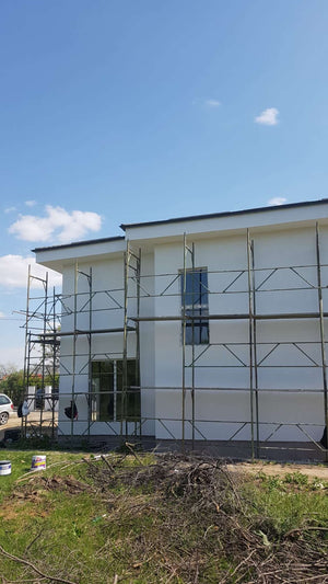 Construction of a 155 sqm House Applying Textured Decorative Plaster thumbnail
