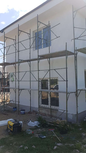 Construction of a 155 sqm House Applying Textured Decorative Plaster thumbnail