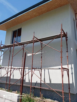 Construction of a House with Completed Facades Using Decorative Exterior Plaster thumbnail