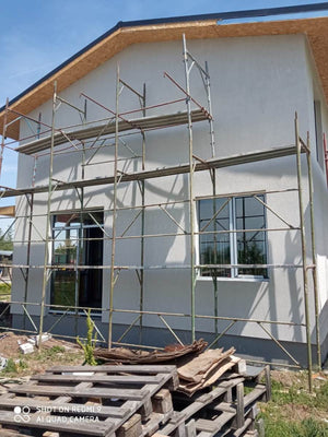 Construction of a House with Completed Facades Using Decorative Exterior Plaster thumbnail