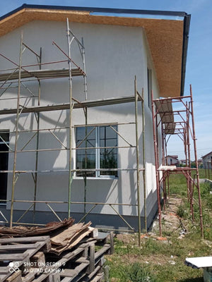 Construction of a House with Completed Facades Using Decorative Exterior Plaster thumbnail
